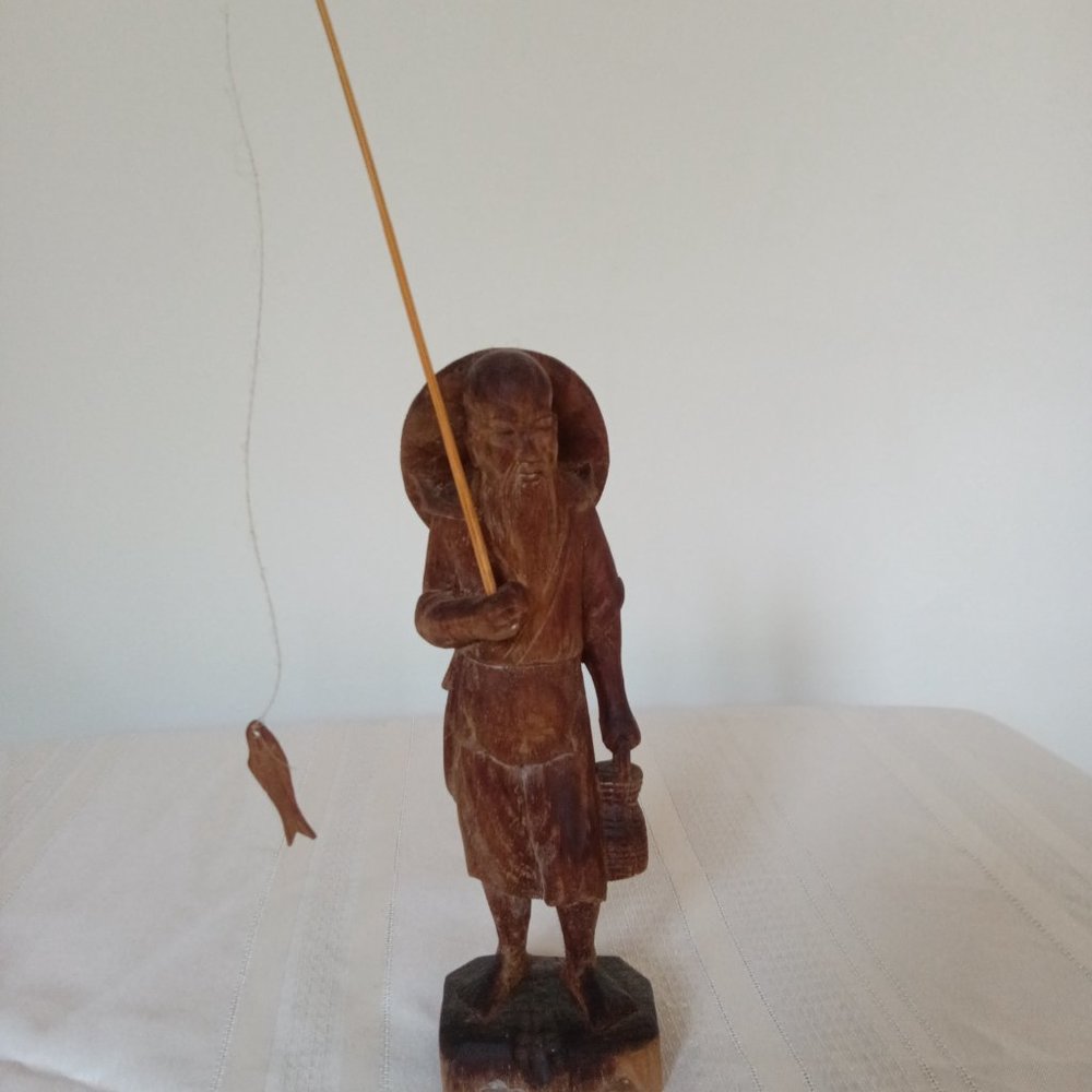 ORIENTAL FISHERMAN